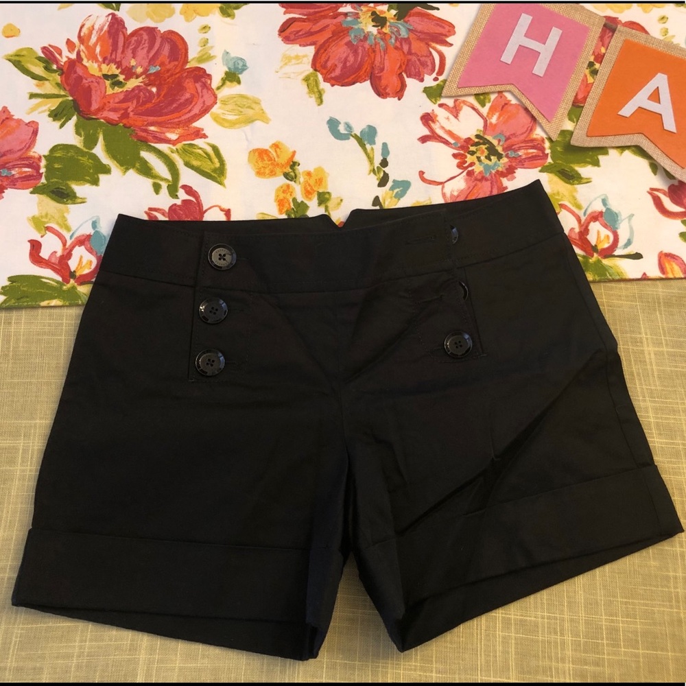 Black button shorts